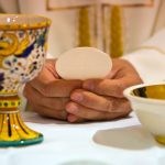 bread becomes the body of Christ in the hands of the pope, holy father